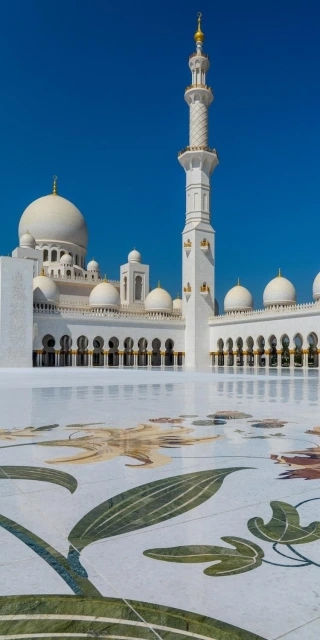 White Mosque With Domes and Minaret