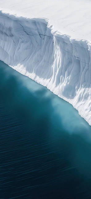 Aerial View of Ice Cliff and Water