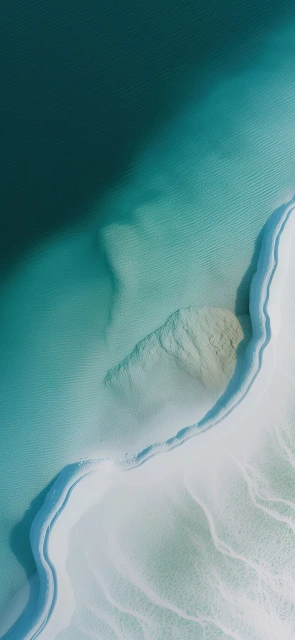Aerial View of Turquoise Water and White Sand