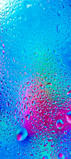 Colorful raindrops on glass