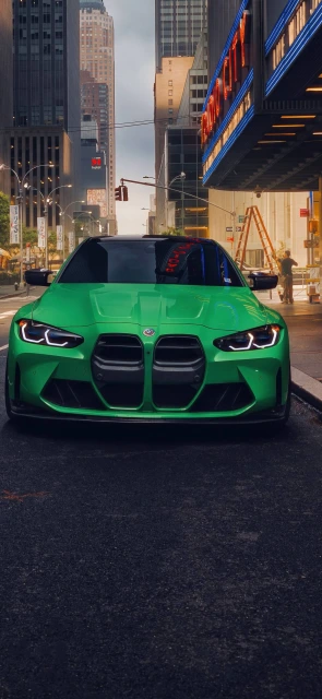 Green BMW M4 City Street