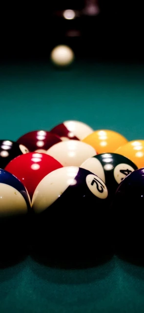 Pool balls on green felt