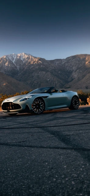 Aston Martin convertible on mountain road