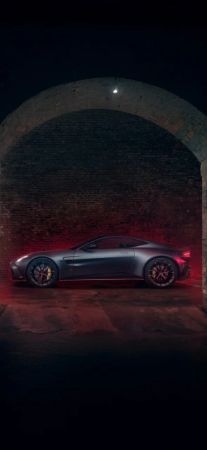 Aston Martin DBS under archway