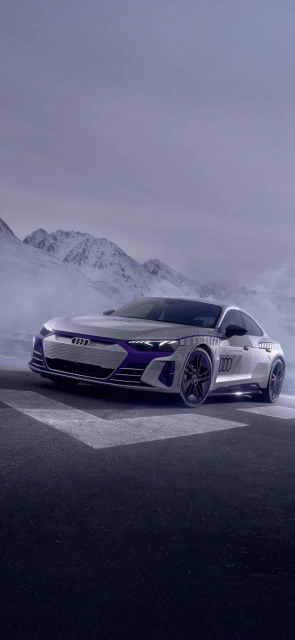 Audi e tron GT on snowy mountain road