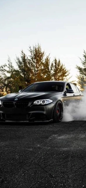 Black BMW Car Drifting