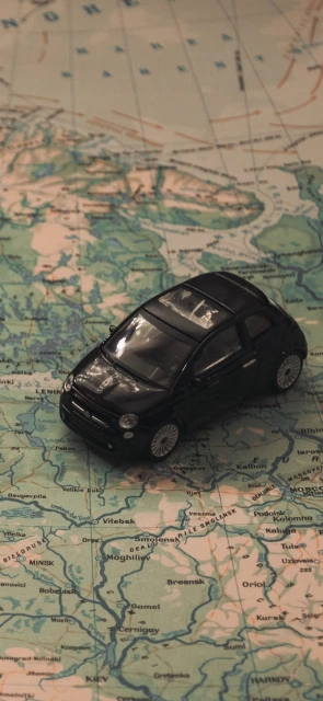 Black Toy Car on Map