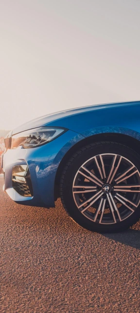 Blue BMW Car Wheel Closeup