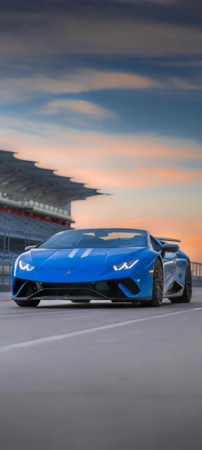 Blue Lamborghini on Racetrack