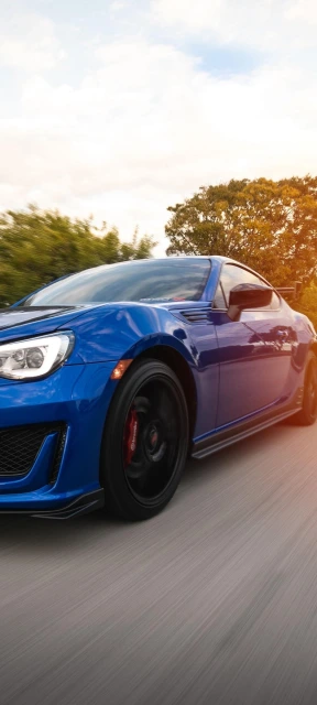 Blue Sports Car Driving