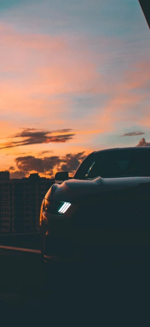 Car at Sunset Sky