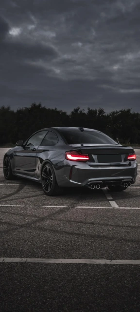 Dark Grey Car Under Cloudy Sky