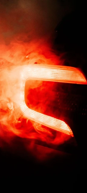Glowing Red Car Taillight Smoke