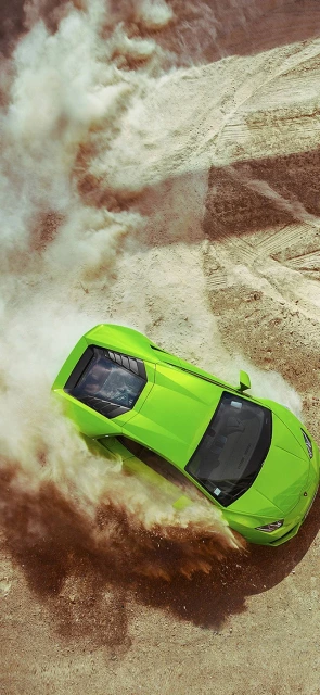 Green Car Drifting on Dirt