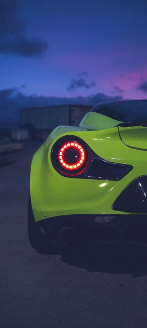 Green Car Rear Light at Dusk