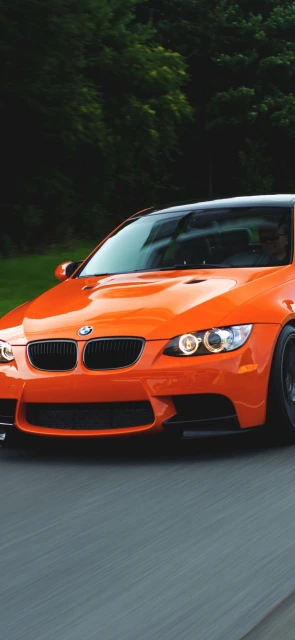 Orange BMW Car Driving