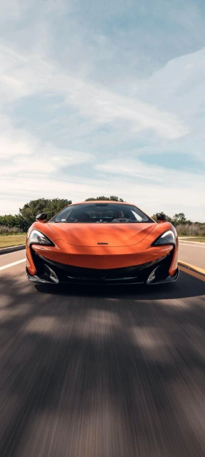 Orange Sports Car Driving