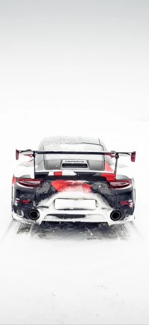 Rear View of Porsche in Snow