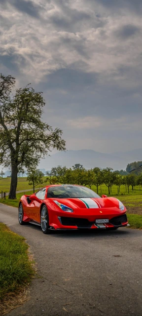 Red Ferrari on Country Road