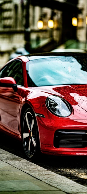 Red Sports Car Parked on Street
