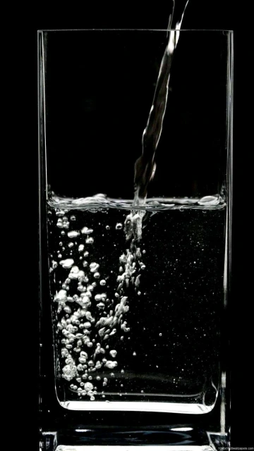 Water Pouring Into Glass