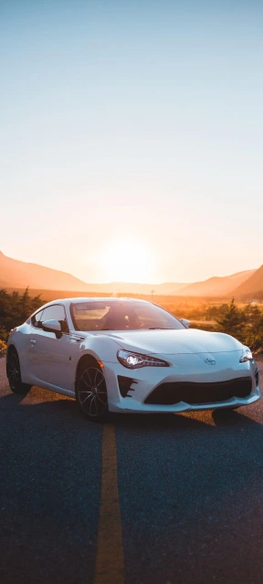 White Car Sunset Road
