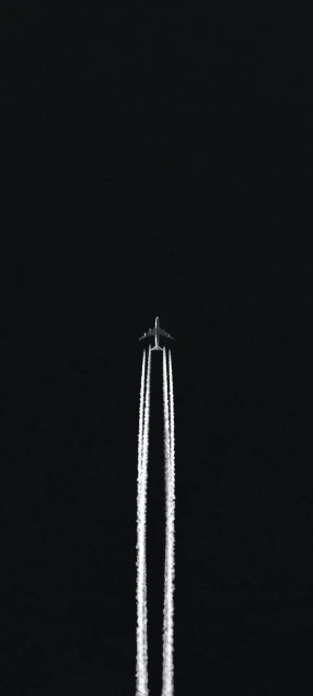 Airplane Contrails at Night