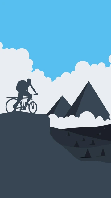 Biker on Mountain Peak