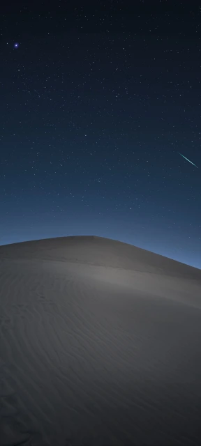 Desert Dune Under Starry Night Sky