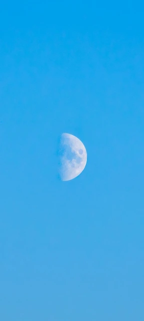 Half Moon in Blue Sky