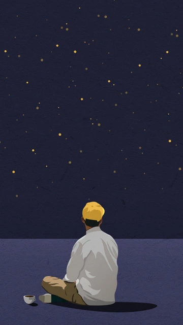 Man Sitting Under Stars