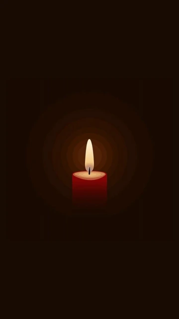 Red Candle in Dark Room