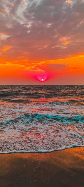 Sunset Over Ocean Waves