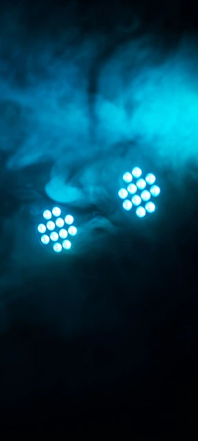 Blue stage lights in smoke