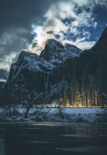 4K Dark Clouds With Snowy Mountain