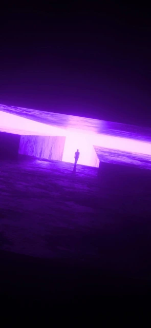 Silhouette standing in purple light