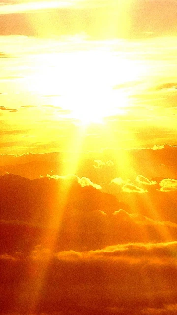 Sunrise Over Clouds