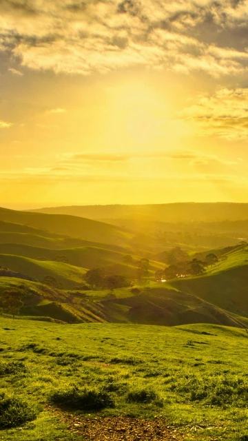 Sunrise Over Green Hills