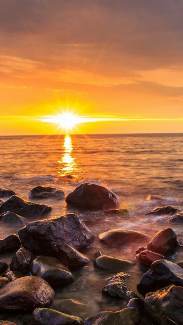 Sunset Over Rocky Beach
