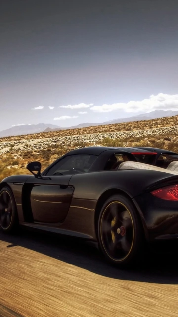 Black Porsche Carrera GT Desert Road