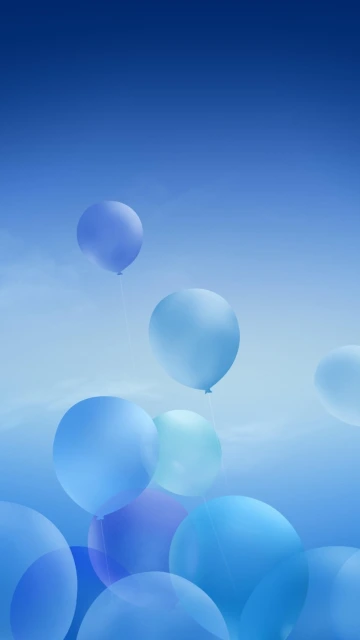 Blue Balloons Against Sky Background