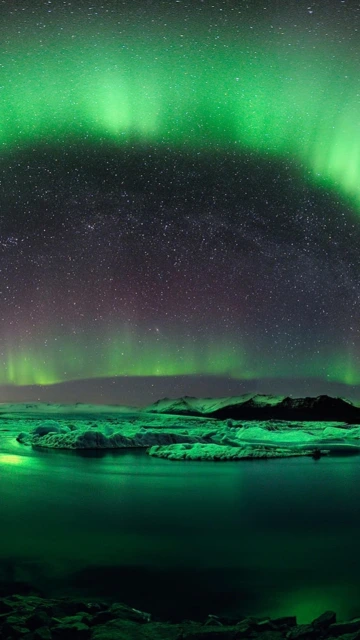 Green Aurora Borealis Over Iceberg Lagoon