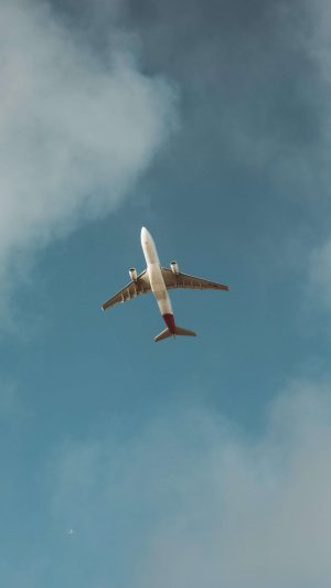 Airplane flying in clouds 300x533 - 4K Phone Wallpapers